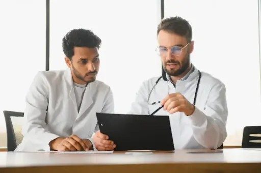 healthcare professionals reviewing patient information